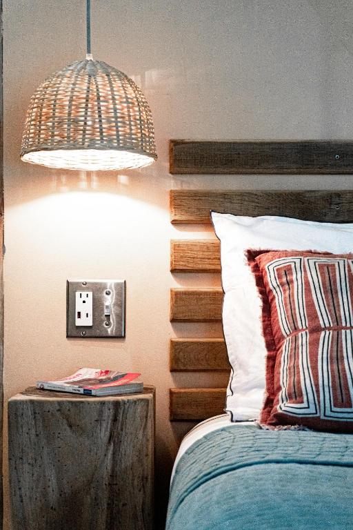 Postel nebo postele na pokoji v ubytování Bocas Garden Lodges