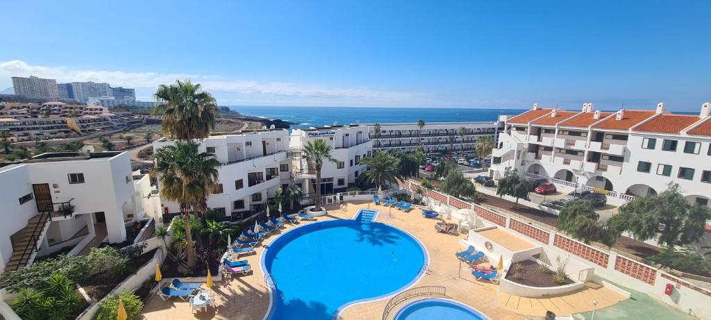 an aerial view of a resort with a swimming pool at Callao Sun & Pool II in Callao Salvaje