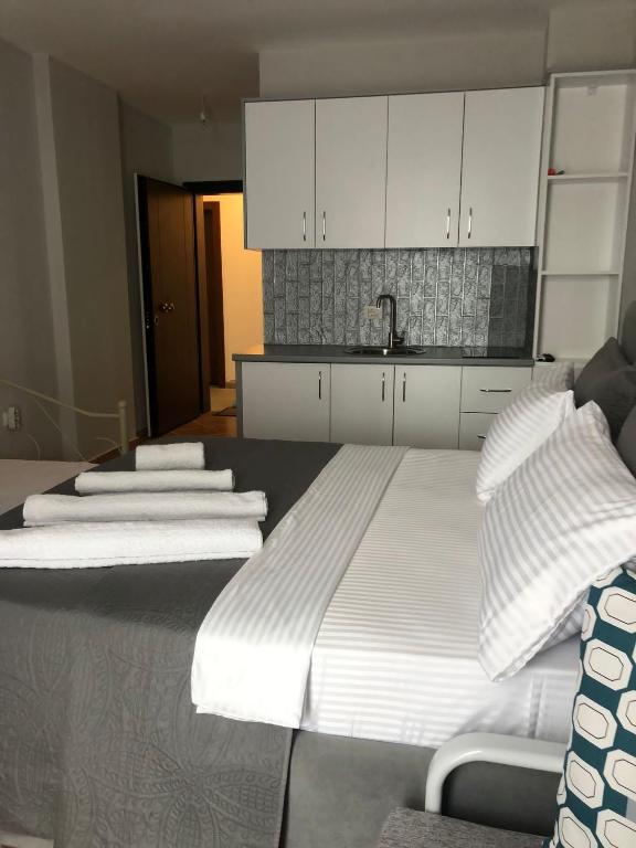 Postel nebo postele na pokoji v ubytování Apartament Raci