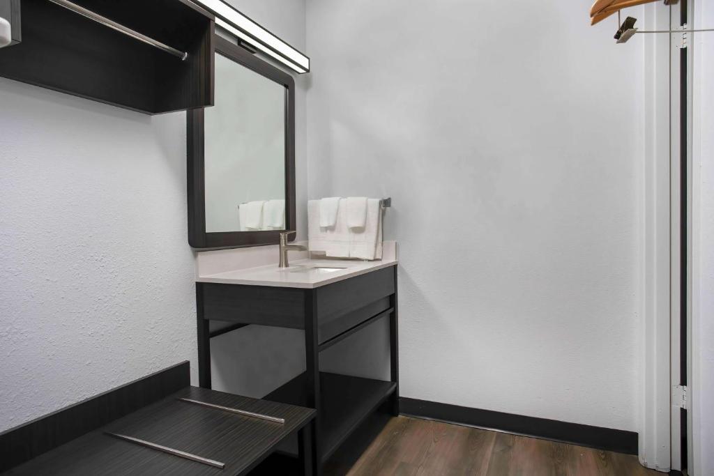 a bathroom with a sink and a mirror at Motel 6-Bend, OR in Bend