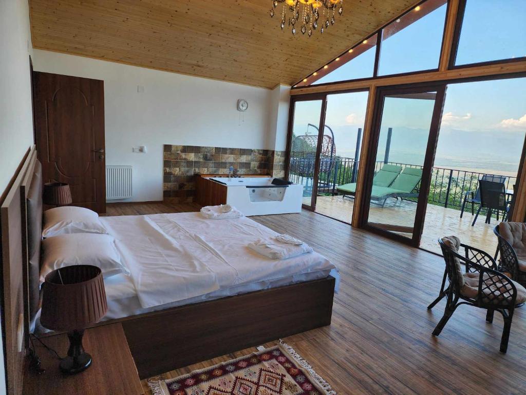Postel nebo postele na pokoji v ubytování Guest House Kusika