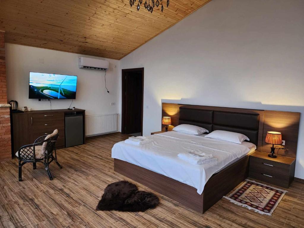 Postel nebo postele na pokoji v ubytování Guest House Kusika