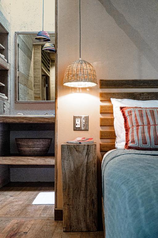 Postel nebo postele na pokoji v ubytování Bocas Garden Lodges