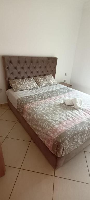 a bed in a bedroom with at Nour 2 in Oued Laou