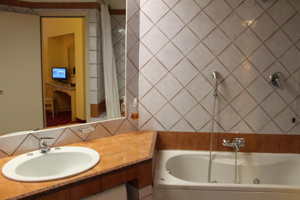 Łazienka w obiekcie Hotel Grillo