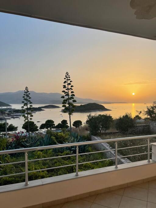 a view of the ocean from a balcony at Vila Athina in Ksamil