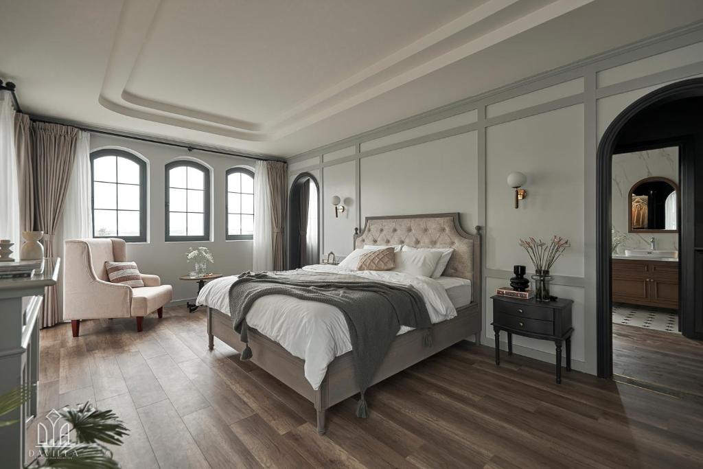 Postel nebo postele na pokoji v ubytování Davilla Đà Lạt Villa Collection