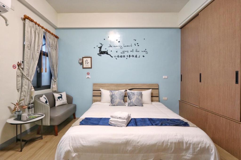 Postel nebo postele na pokoji v ubytování Wanghong Homestay