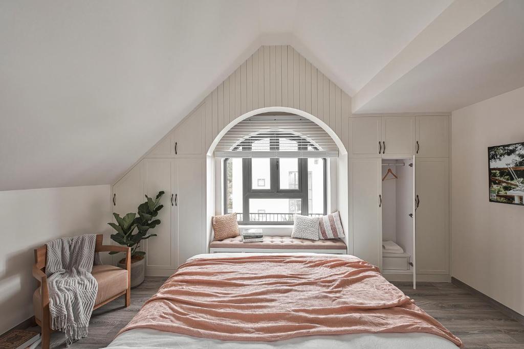 Postel nebo postele na pokoji v ubytování Davilla Đà Lạt Villa Collection
