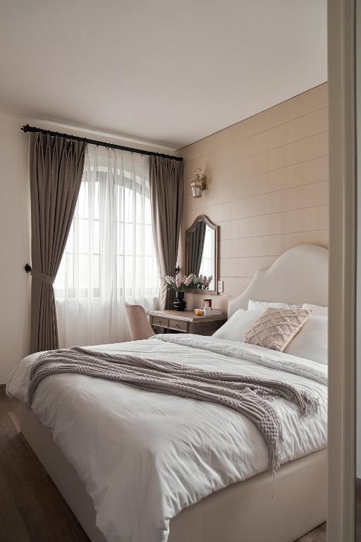 Postel nebo postele na pokoji v ubytování Davilla Đà Lạt Villa Collection