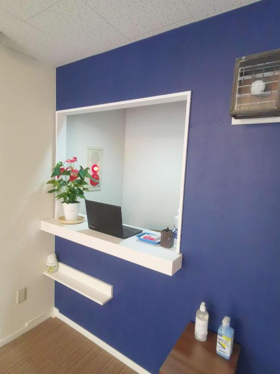 TV a/nebo společenská místnost v ubytování Business Hotel Azuma