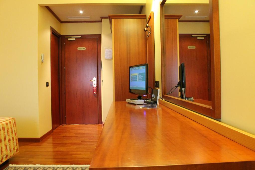 Telewizja i/lub zestaw kina domowego w obiekcie Hotel Grillo