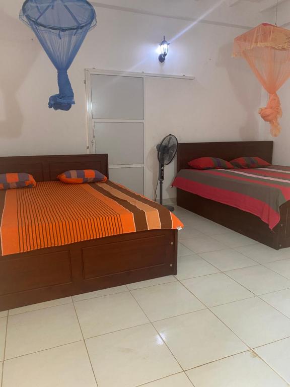 Postel nebo postele na pokoji v ubytování Savenndra Resorts