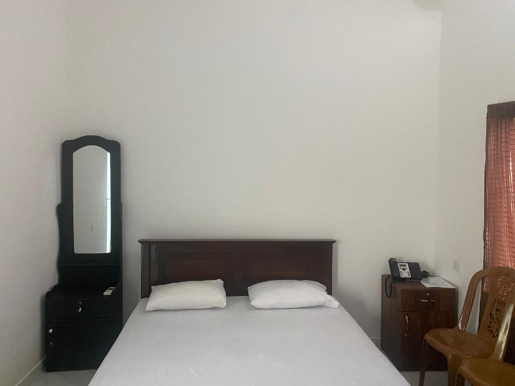 Postel nebo postele na pokoji v ubytování Savenndra Resorts