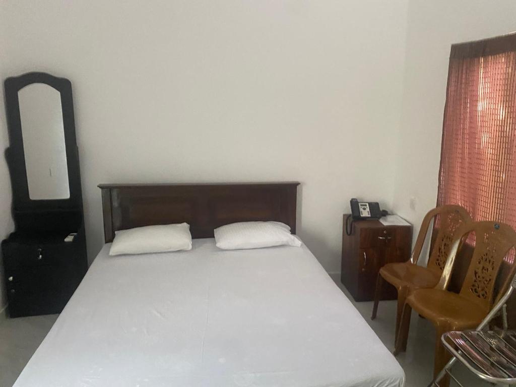 Postel nebo postele na pokoji v ubytování Savenndra Resorts