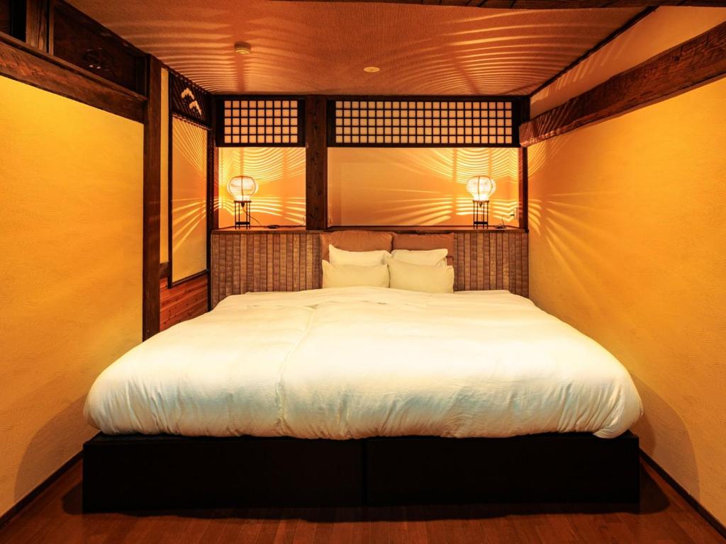 Postel nebo postele na pokoji v ubytování Tsuruya / Vacation STAY 59071