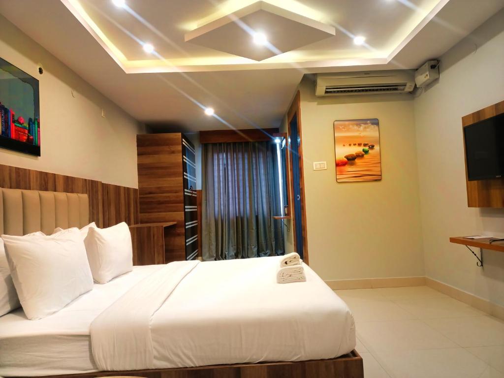 Hotel Avenue Suites Near International Airport Bangalore - 高级国王房间