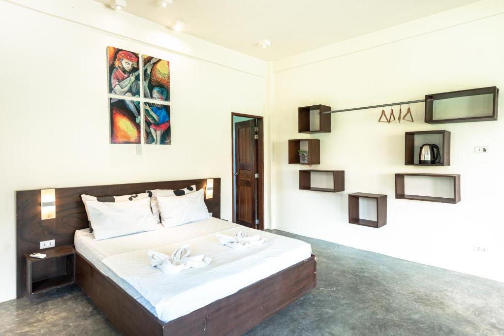 Postel nebo postele na pokoji v ubytování Ohana Resort Siargao
