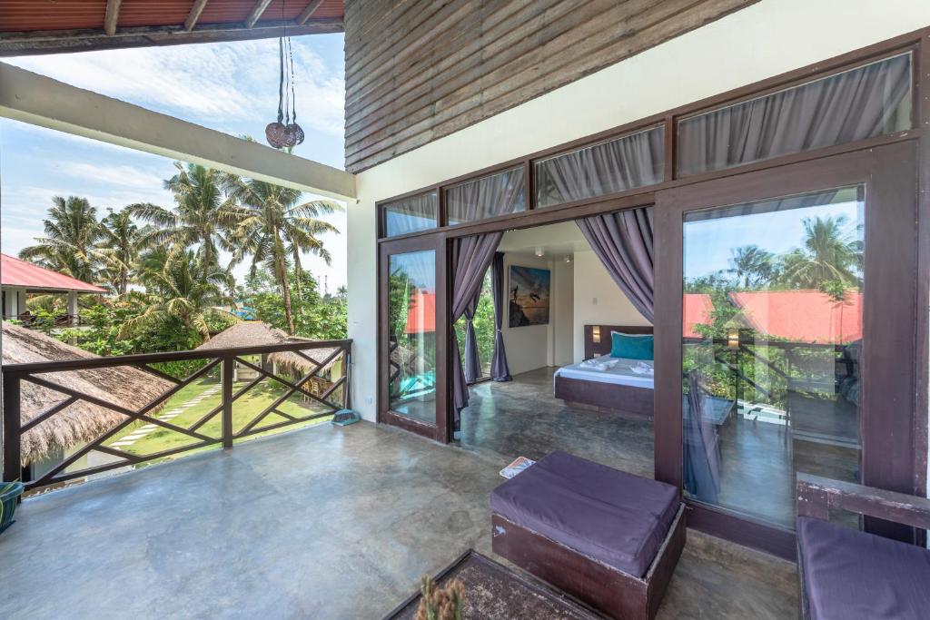 Balkón nebo terasa v ubytování Ohana Resort Siargao
