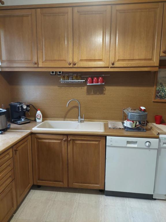 A kitchen or kitchenette at Didi House