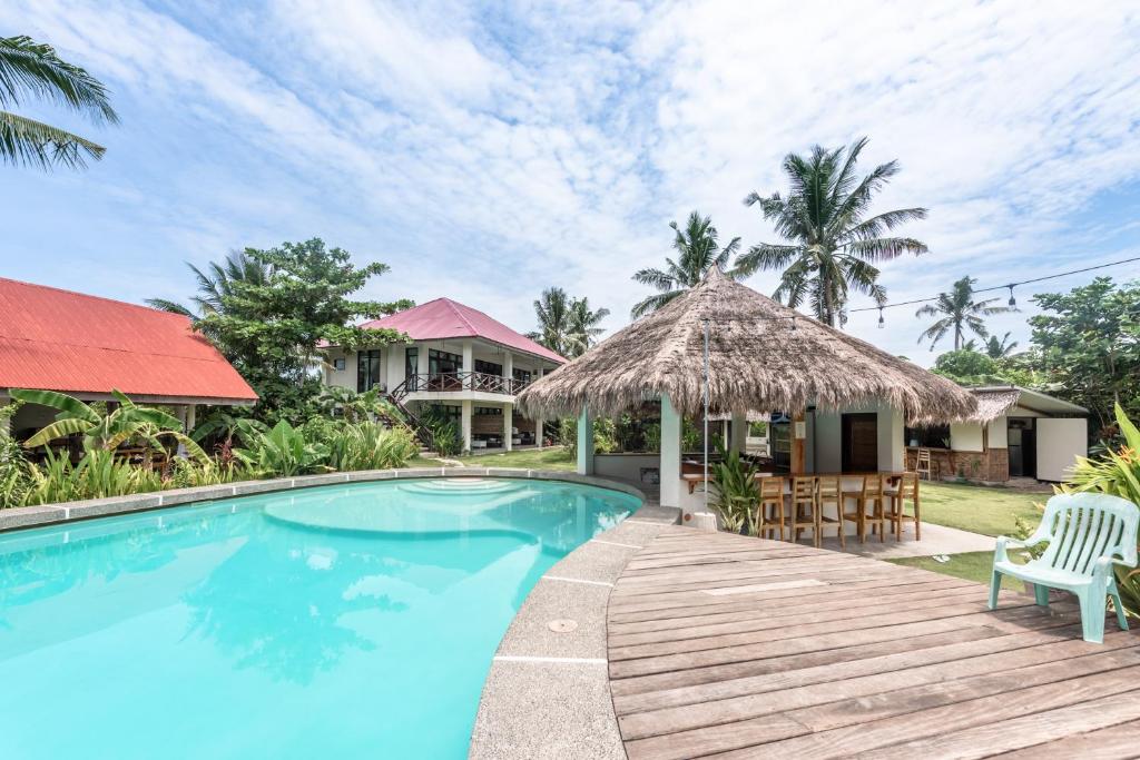 Bazén v ubytování Ohana Resort Siargao nebo v jeho okolí