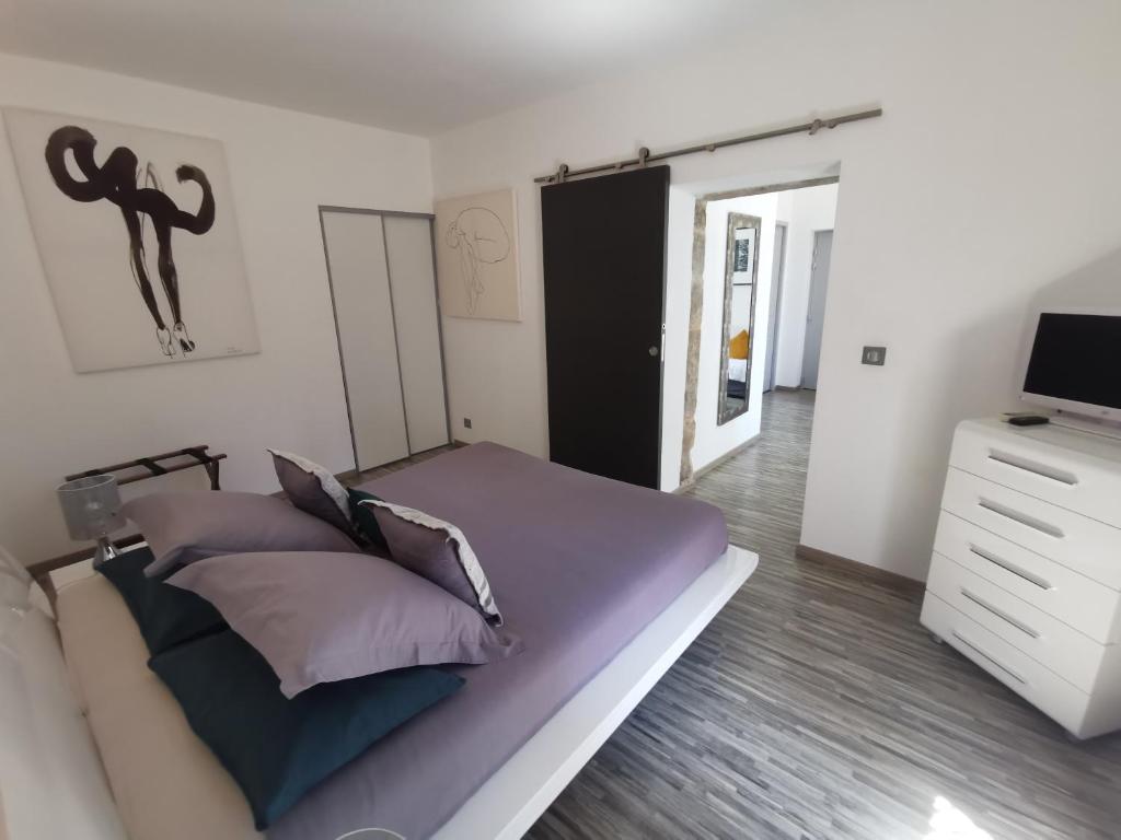 Postel nebo postele na pokoji v ubytování Le Mas des Loges - Les Vans / Chambonas