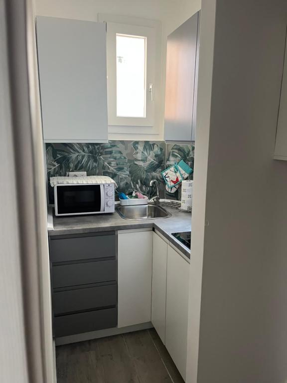 Kuchyň nebo kuchyňský kout v ubytování Anyma Home