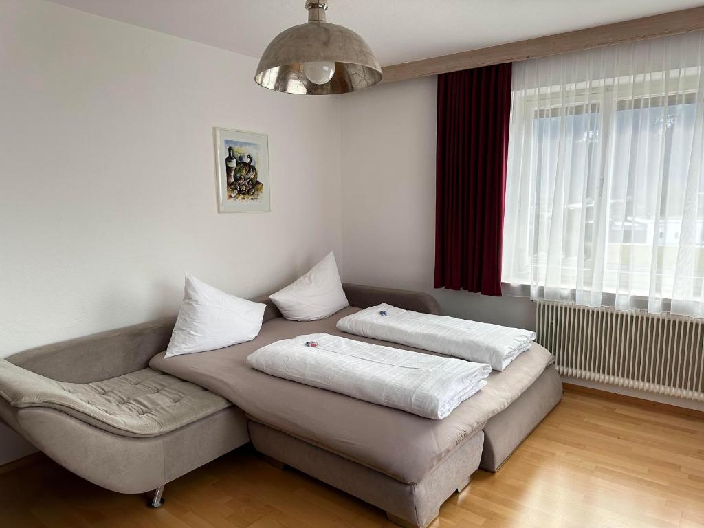 Postel nebo postele na pokoji v ubytování Haus Hermine