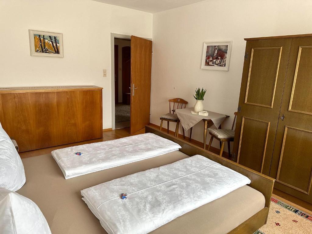 Postel nebo postele na pokoji v ubytování Haus Hermine