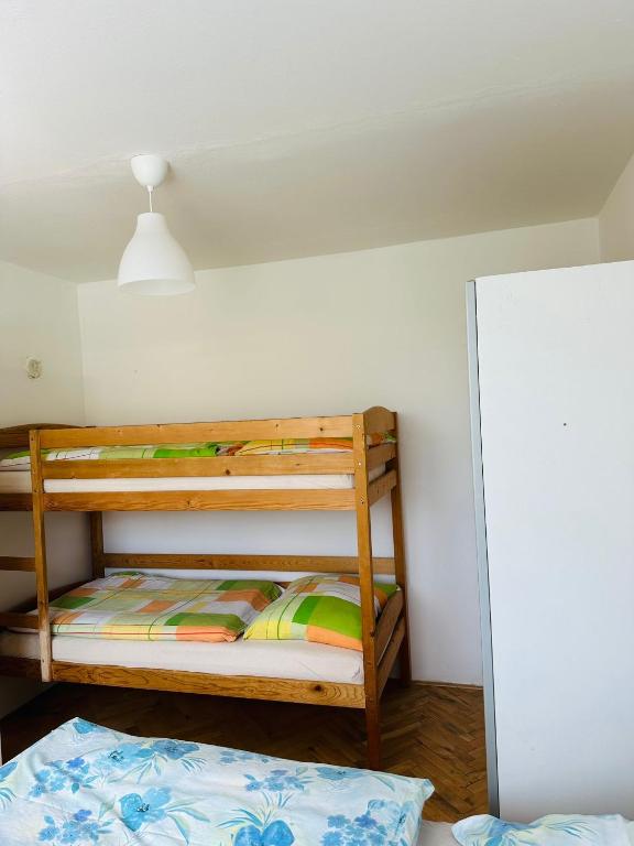 Postel nebo postele na pokoji v ubytování Apartmán pod Boubínem