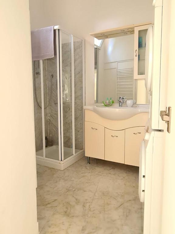 a bathroom with a shower and a sink at Mont Boron Exclusive Apartment in Villa Belle Époque in Nice