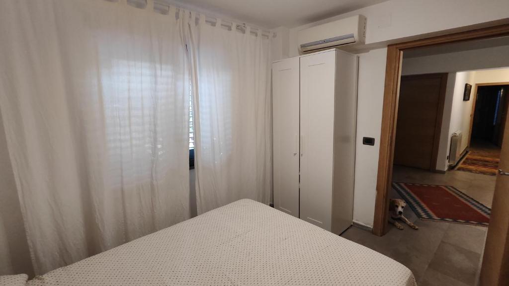 A bed or beds in a room at Villa Le Lanterne Pool & Relax