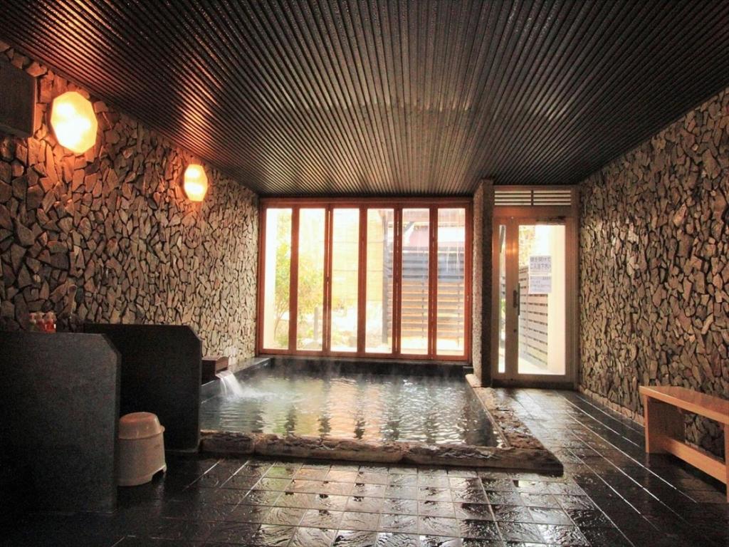 Posezení v ubytování 三朝温泉　桃園館