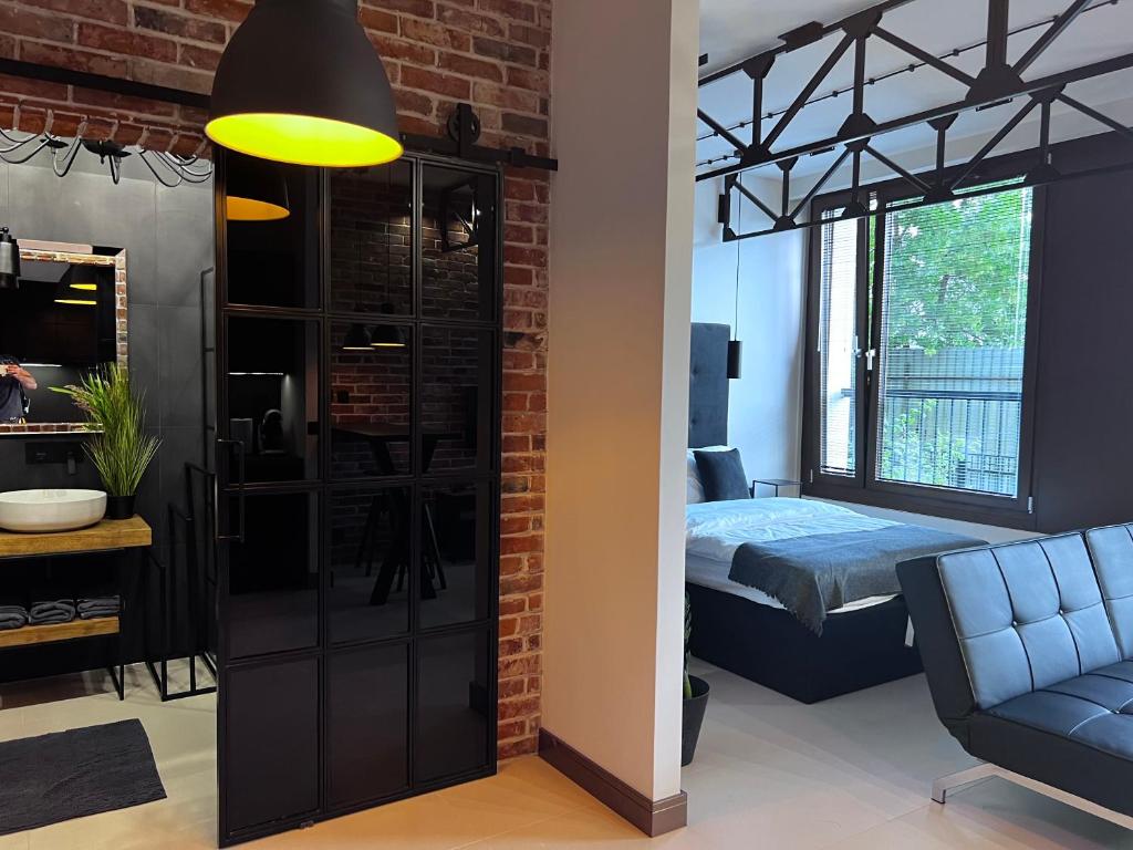 Posedenie v ubytovaní Loft Apartment Browary Warszawskie