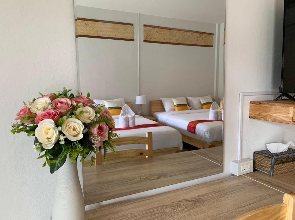 Postel nebo postele na pokoji v ubytování Hotel Pailifornia