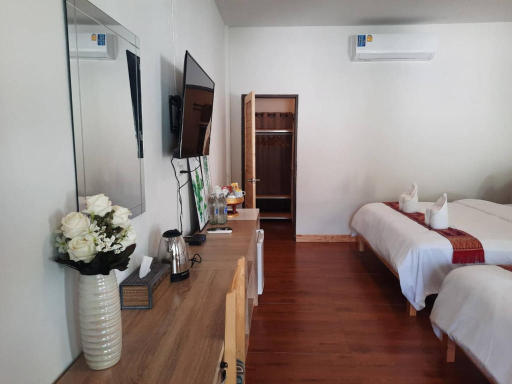Postel nebo postele na pokoji v ubytování Hotel Pailifornia