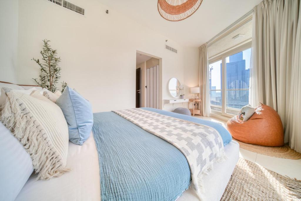 Postel nebo postele na pokoji v ubytování Mangrove Place, Reem Island, Abu Dhabi - Mint Stay