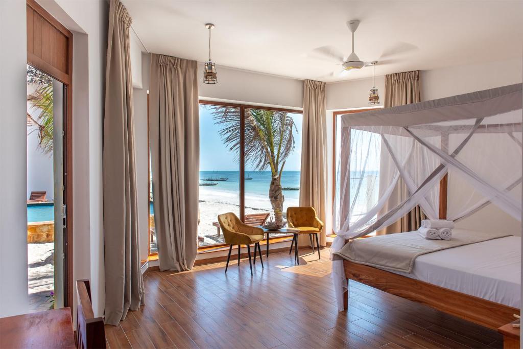 Postel nebo postele na pokoji v ubytování S&S HOTEL
