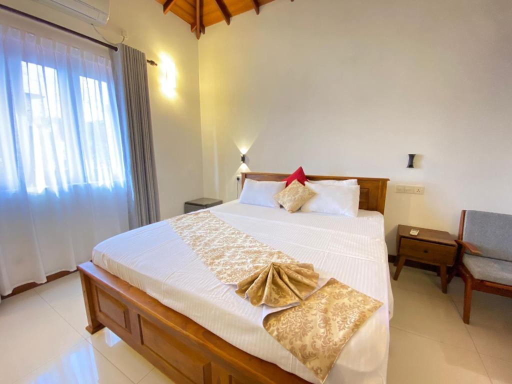 Postel nebo postele na pokoji v ubytování New Sea Villa