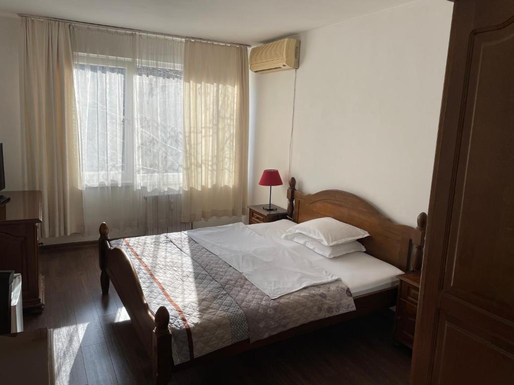 Postel nebo postele na pokoji v ubytování Hotel Rotasar