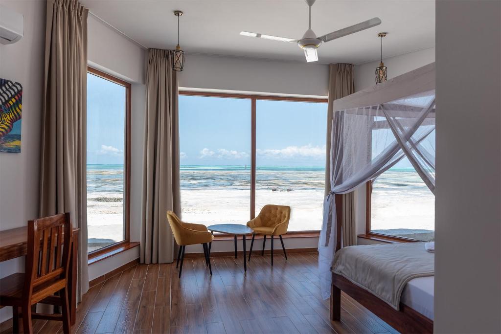 Postel nebo postele na pokoji v ubytování S&S HOTEL