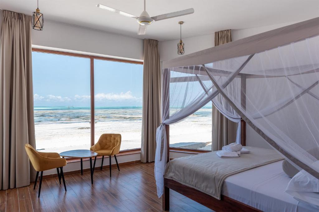 Postel nebo postele na pokoji v ubytování S&S HOTEL