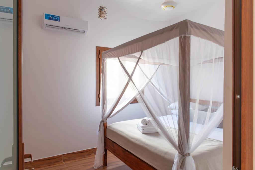 Postel nebo postele na pokoji v ubytování S&S HOTEL