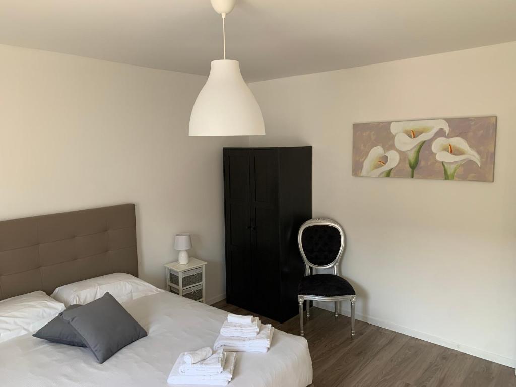 Postel nebo postele na pokoji v ubytování Smart Living Swiss