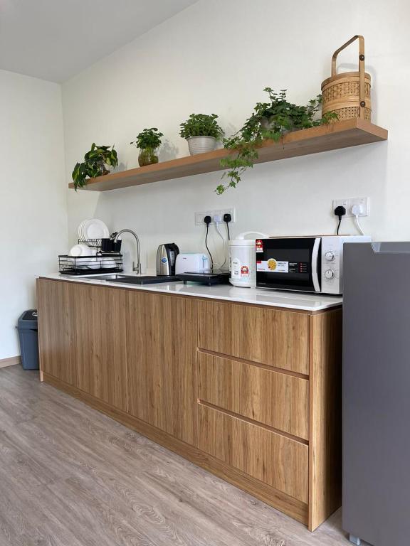 Kuchyň nebo kuchyňský kout v ubytování Utopia Homestay @ Cameron Centrum