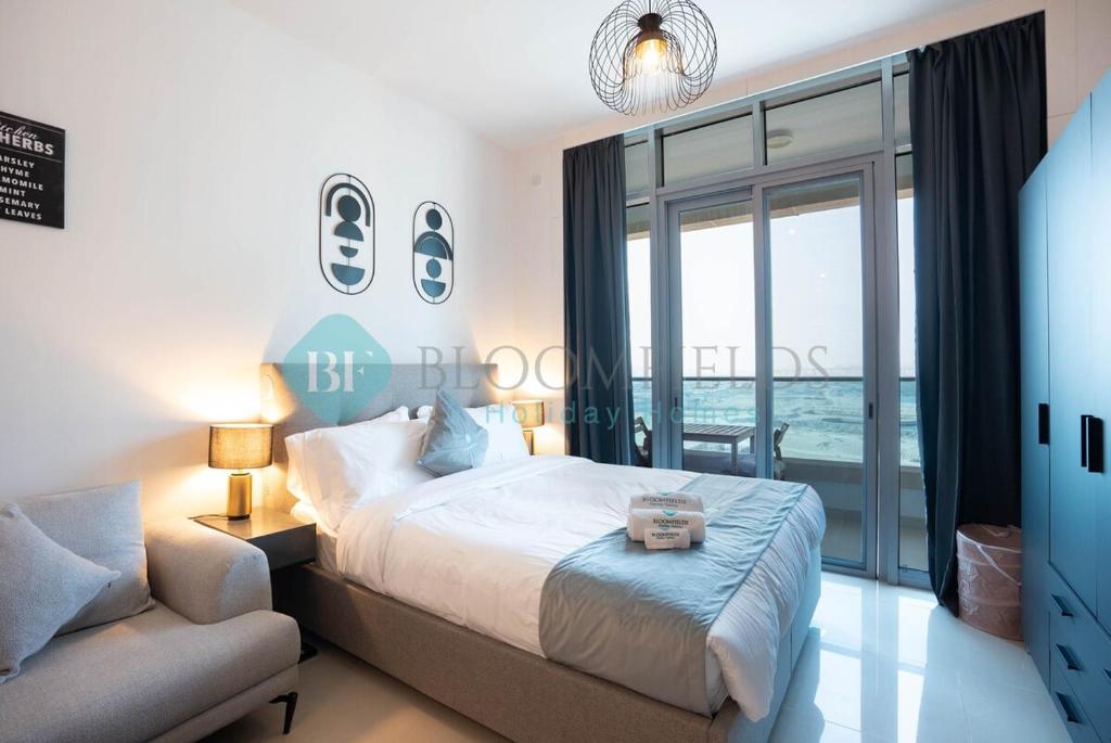 Postel nebo postele na pokoji v ubytování Premium Canal View Julphar