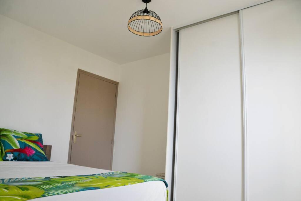 Postel nebo postele na pokoji v ubytování Appartement équipé avec vue et place de parking