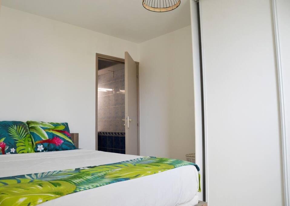 Postel nebo postele na pokoji v ubytování Appartement équipé avec vue et place de parking