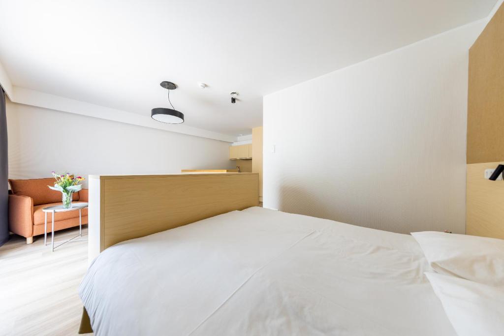 Postel nebo postele na pokoji v ubytování Saaremaa Rannahotell ' Beach Hotel