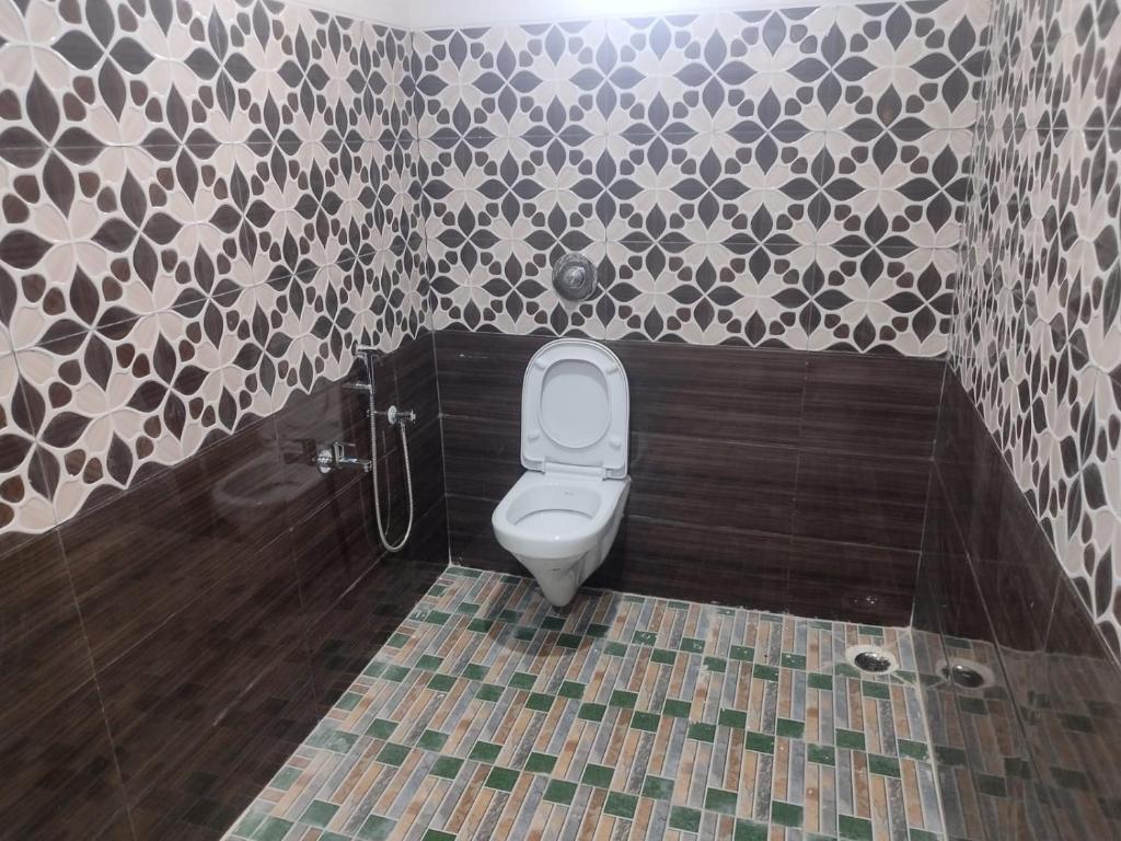Koupelna v ubytování HOTEL AYUSH INTERNATIONAL